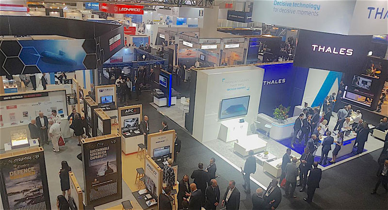 Overview of the main floor of a defence and industry conference